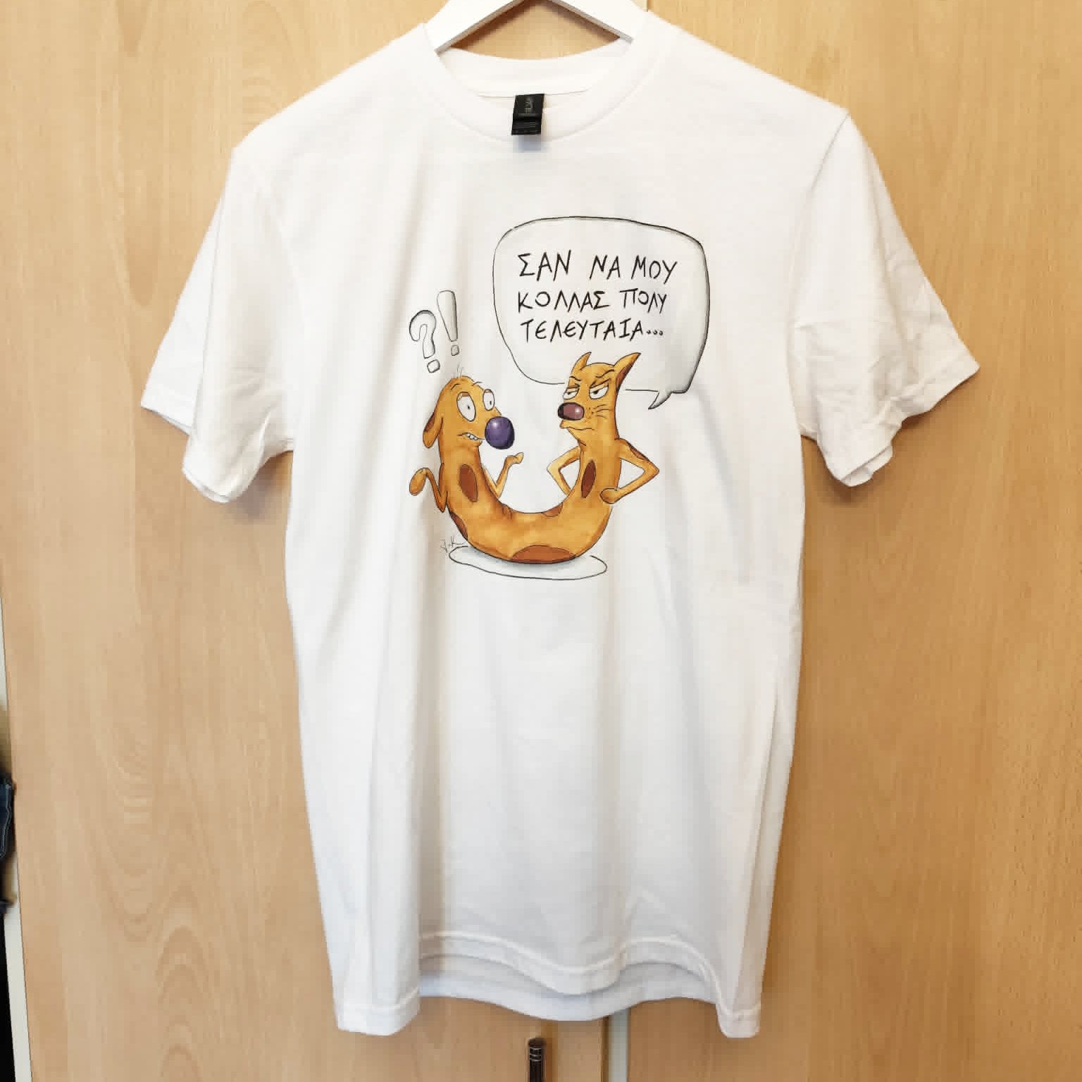 White unisex T-shirt featuring the hand-drawn "Cat-ch Me If You Can" cartoon illustration by Sketch Stories