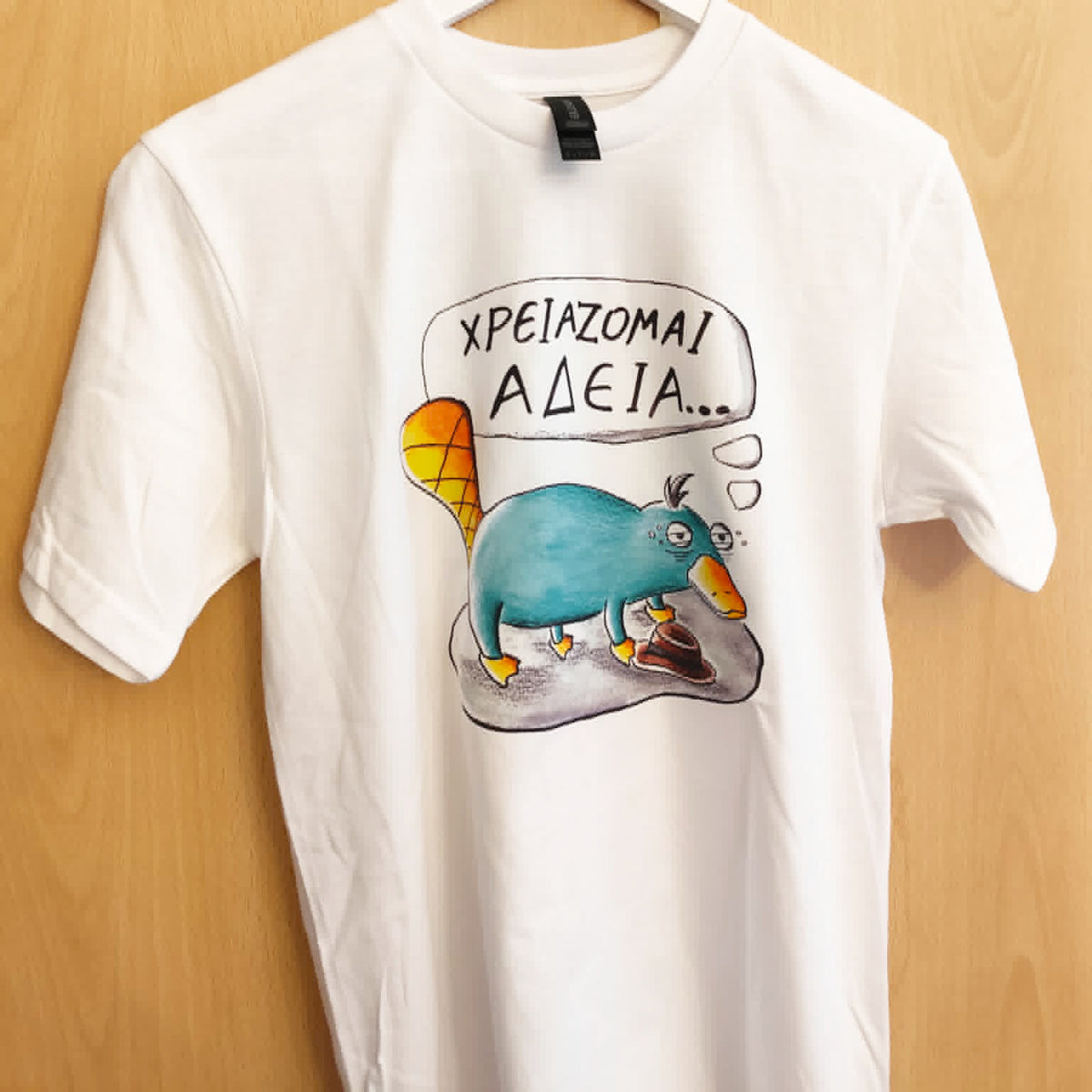 White unisex t-shirt with the hand-drawn "Exhausted Spy" design by Sketch Stories.