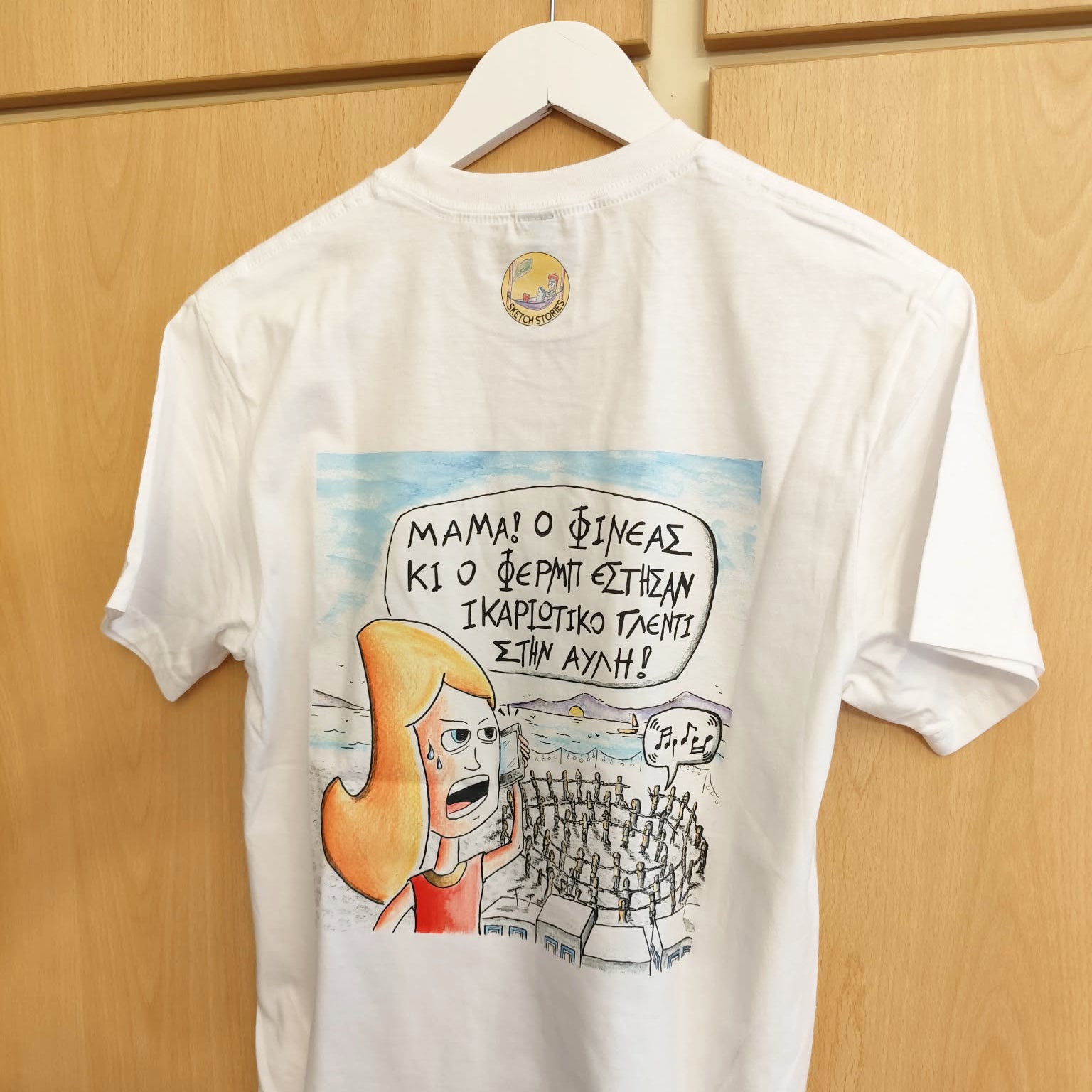 White unisex T-shirt featuring the hand-drawn "Ikarian Dance" cartoon illustration by Sketch Stories
