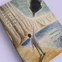 Close-up of the Light in the Darkness illustration on an A5 notebook cover.
