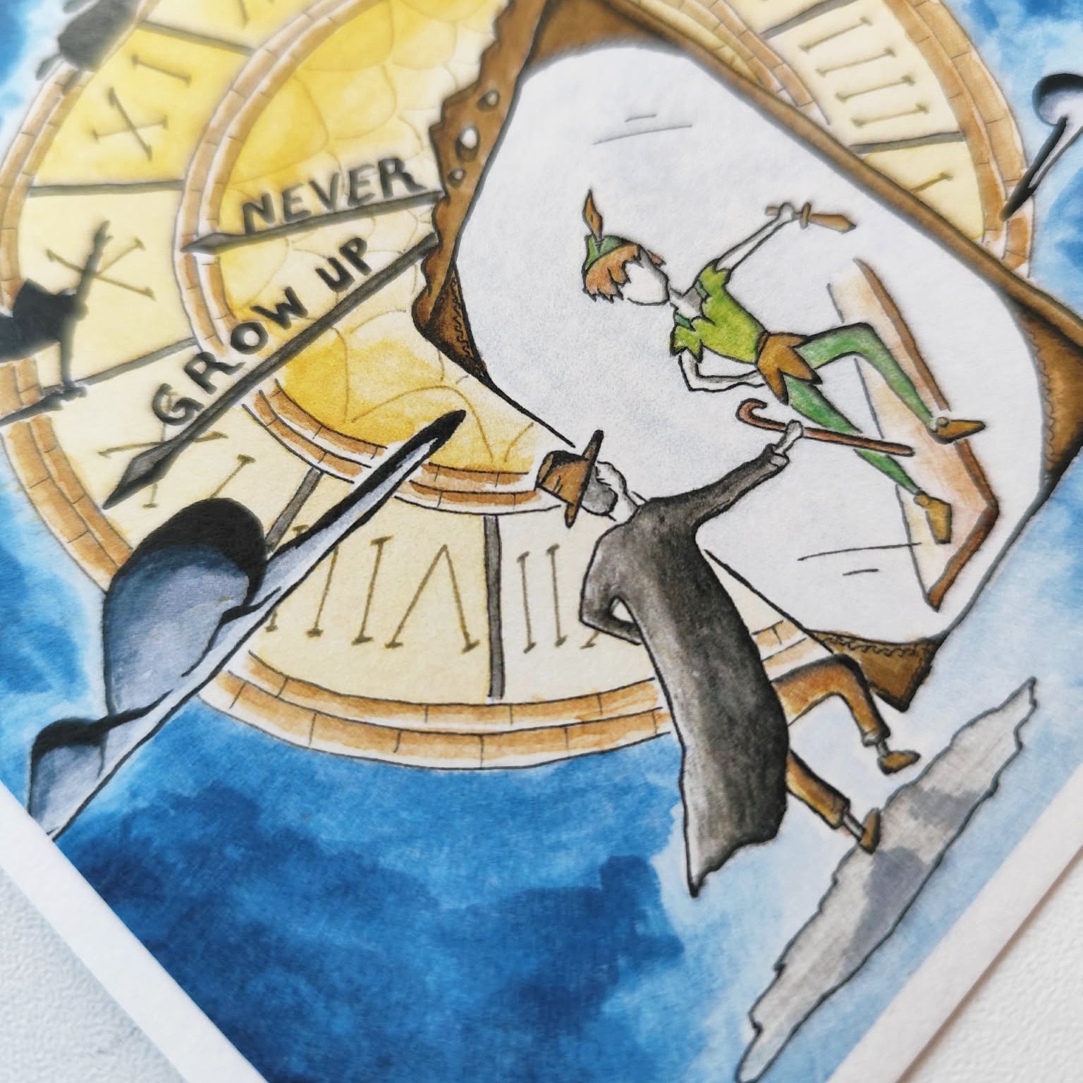 Close-up view of Never Grow Up art print showing watercolor details and hand-drawn artwork