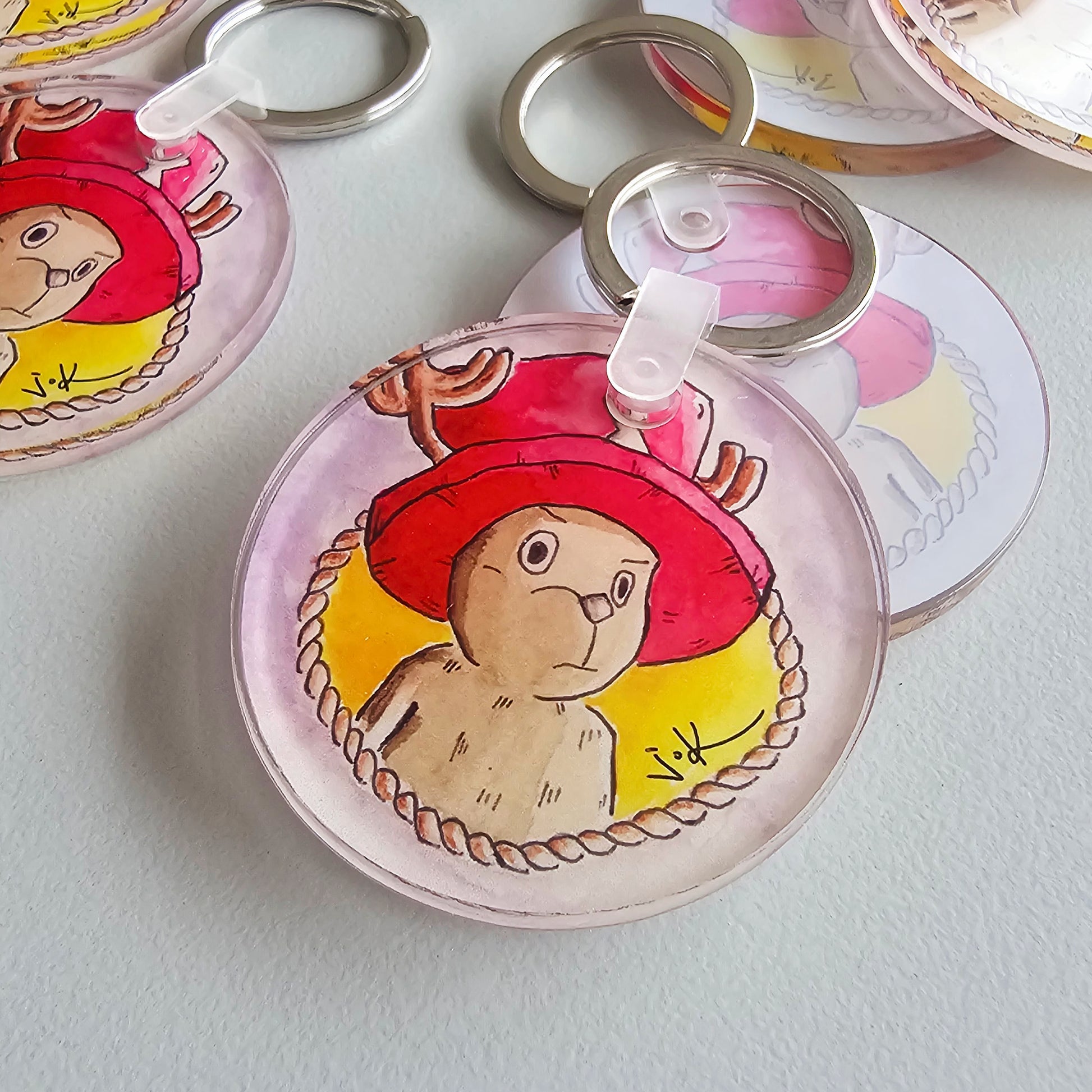 Close-up of the Reindeer Companion acrylic keychain by Sketch Stories.
