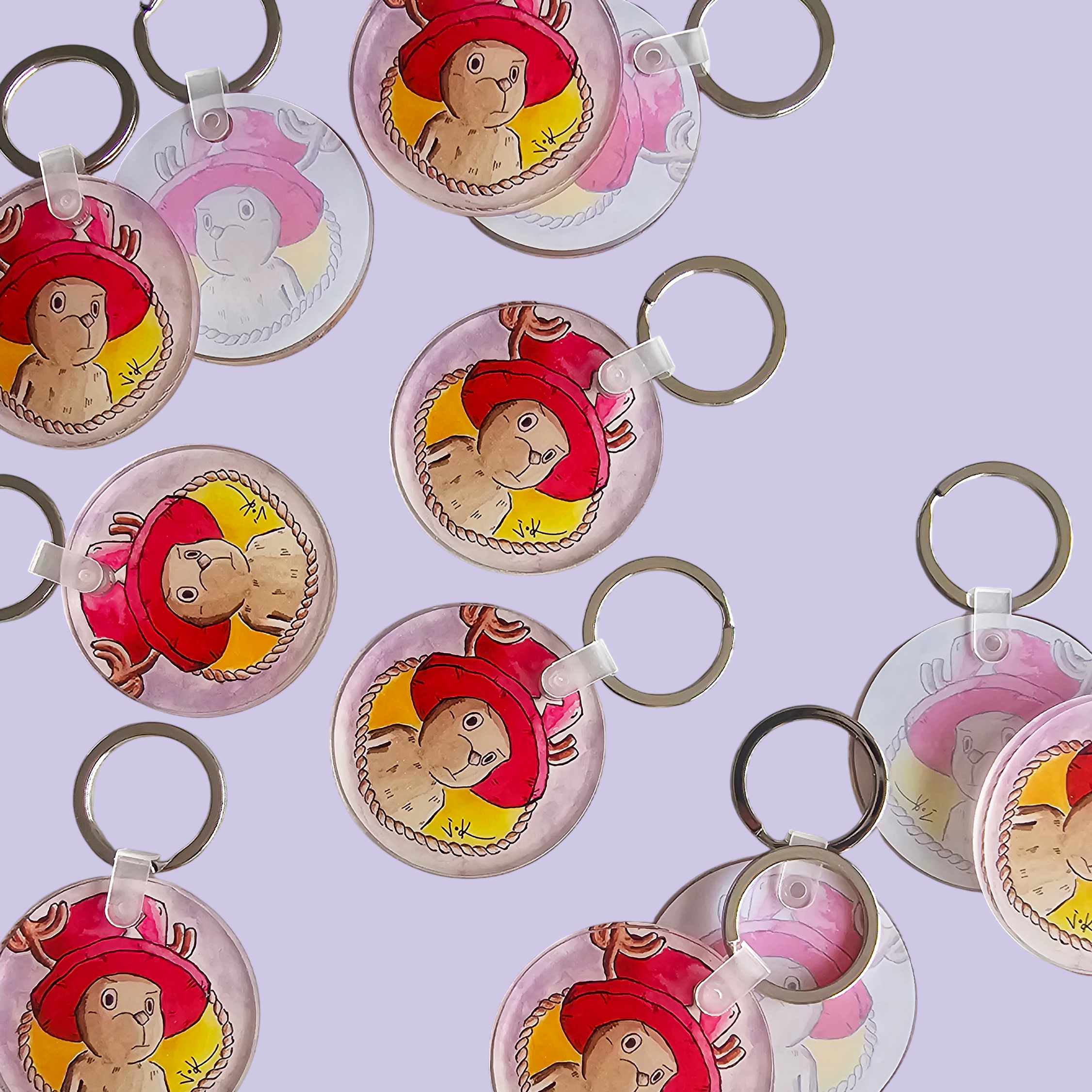 Flat lay of Reindeer Companion acrylic keychains by Sketch Stories.