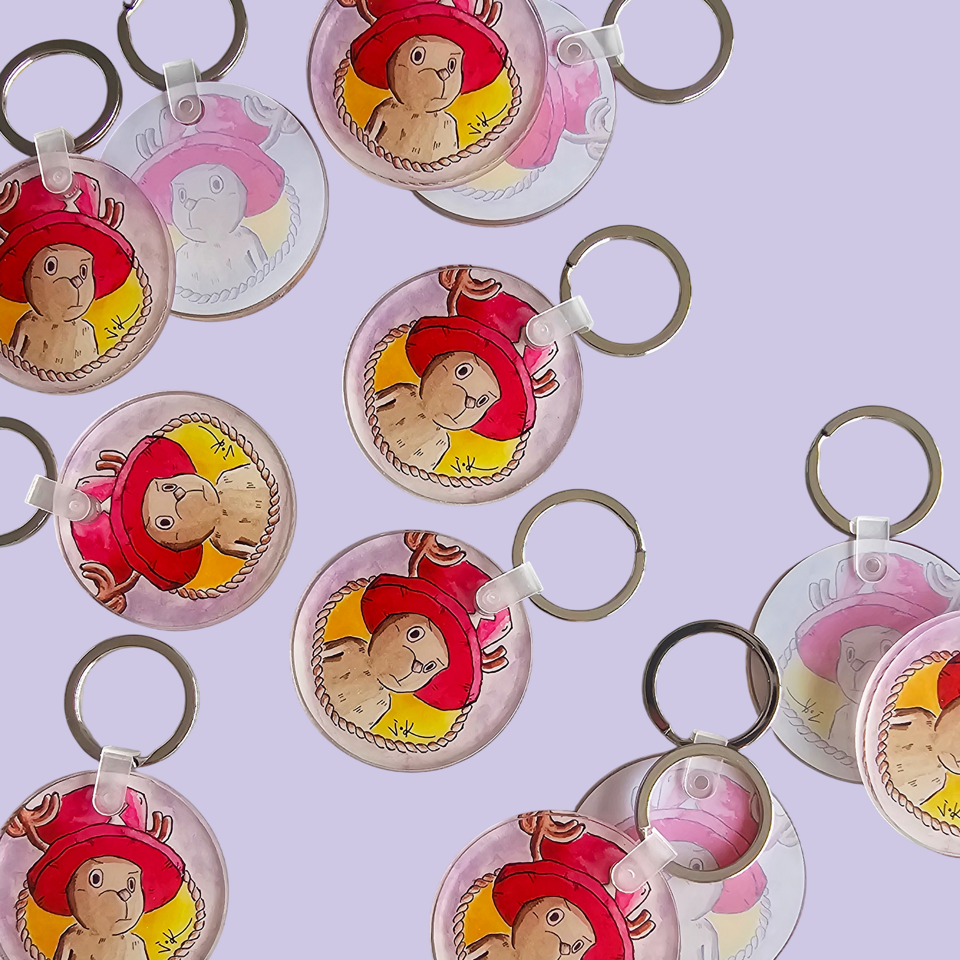 Flat lay of Reindeer Companion acrylic keychains by Sketch Stories.